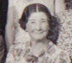 A black and white photo of a person

Description automatically generated